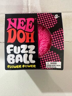 NIB NEEDOH Flower Power fuzz ball - Pink SPECIAL smiley face design